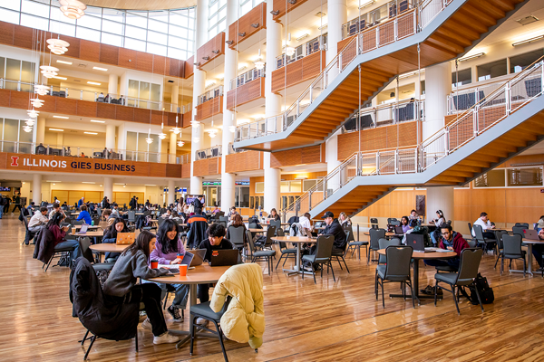 Students Sitting at Tables in the Lincoln International Atrium at Business Instructional Facility Students Sitting at Tables in the Lincoln International Atrium at Business Instructional Facility
