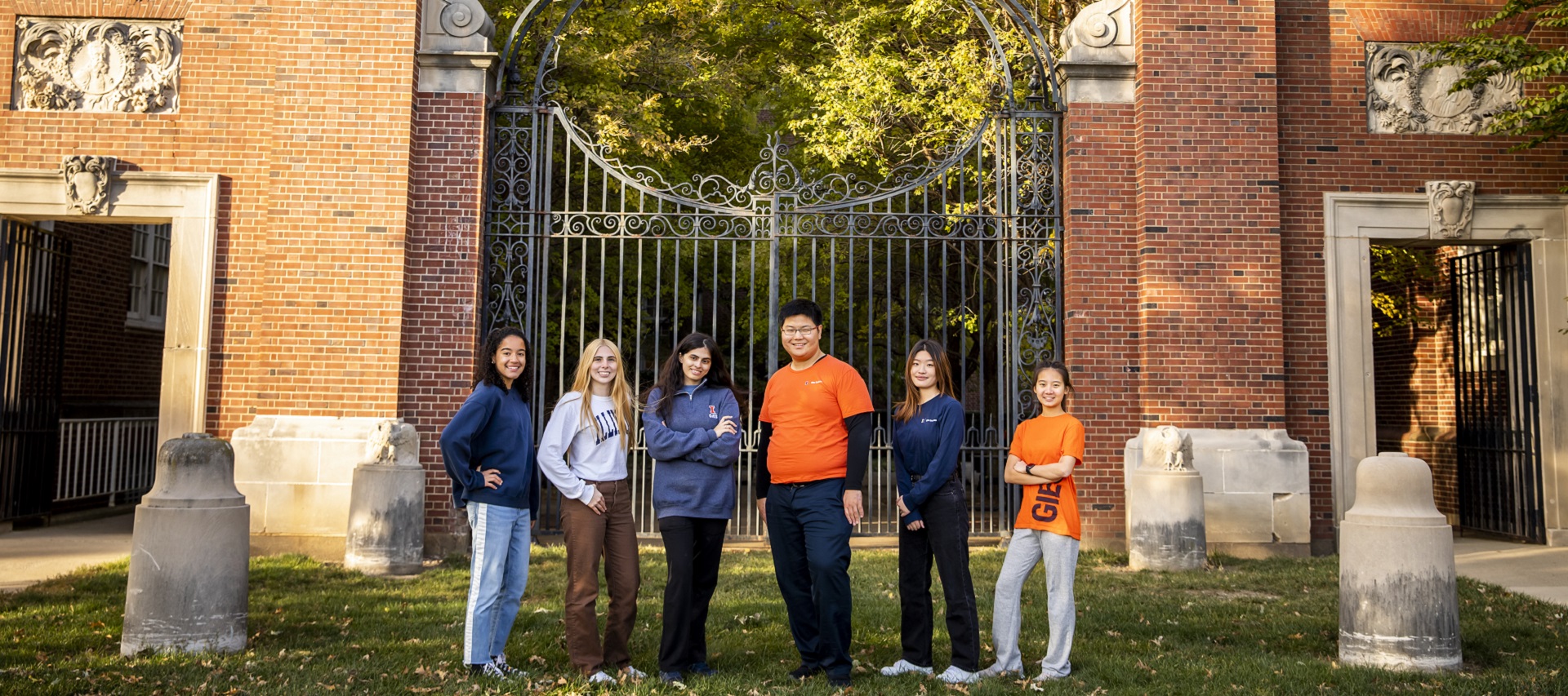 Three female students outside smiling